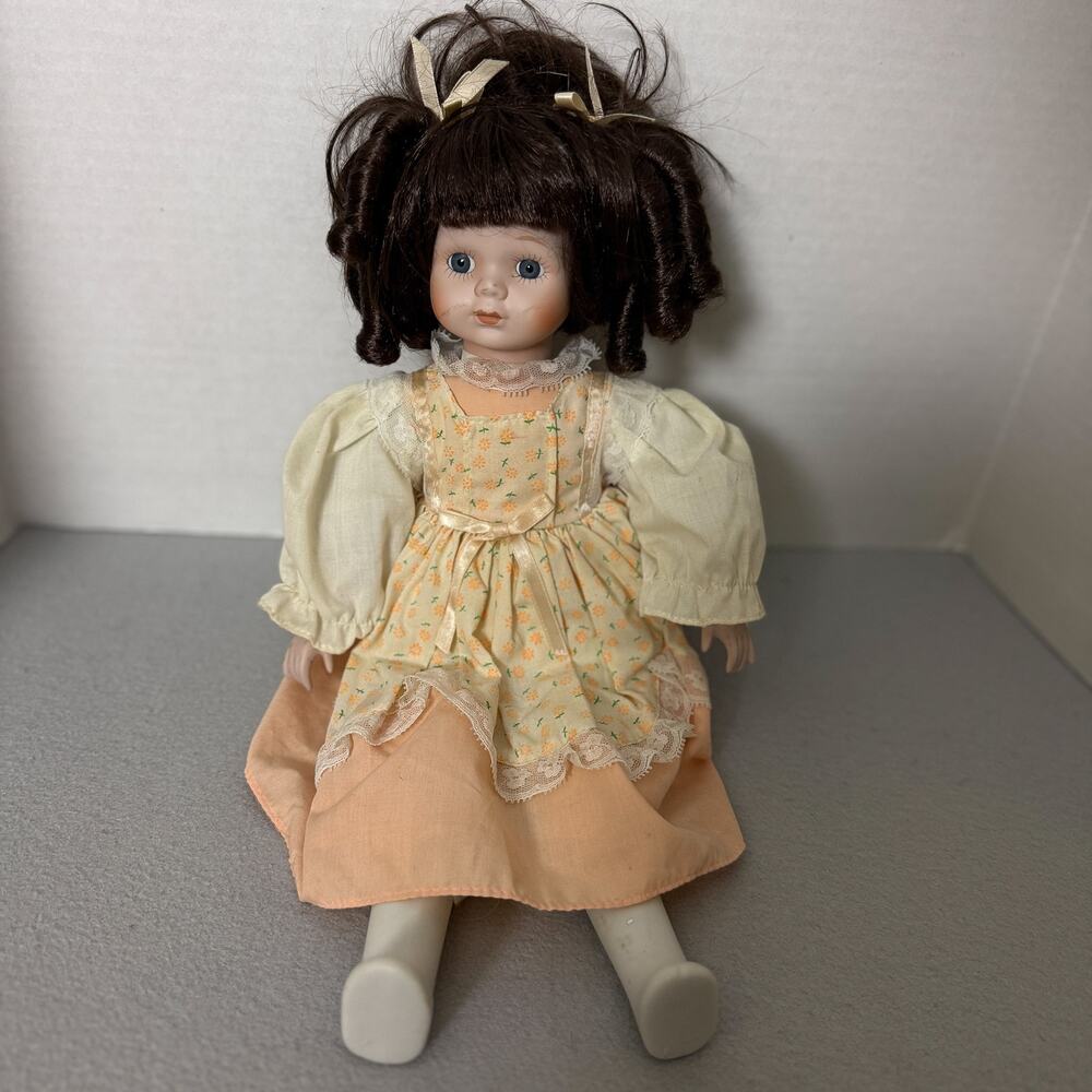 Vintage Brinn's 1989 Porcelain Doll Blue Eyes Brown Curls Floral Lace Dress